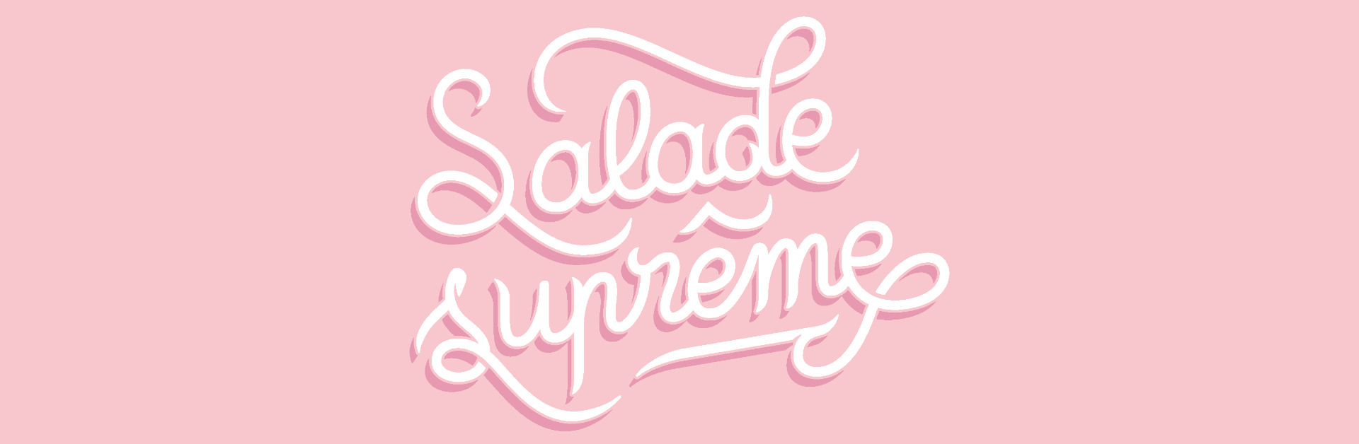 logo salade supreme sur fond rose clair